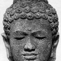 Голова будды. Чанди Плаосан. Камень. Выс. 43 см. IX в. Долина Прамбанан. Центральная Ява. Джакарта. Национальный музей